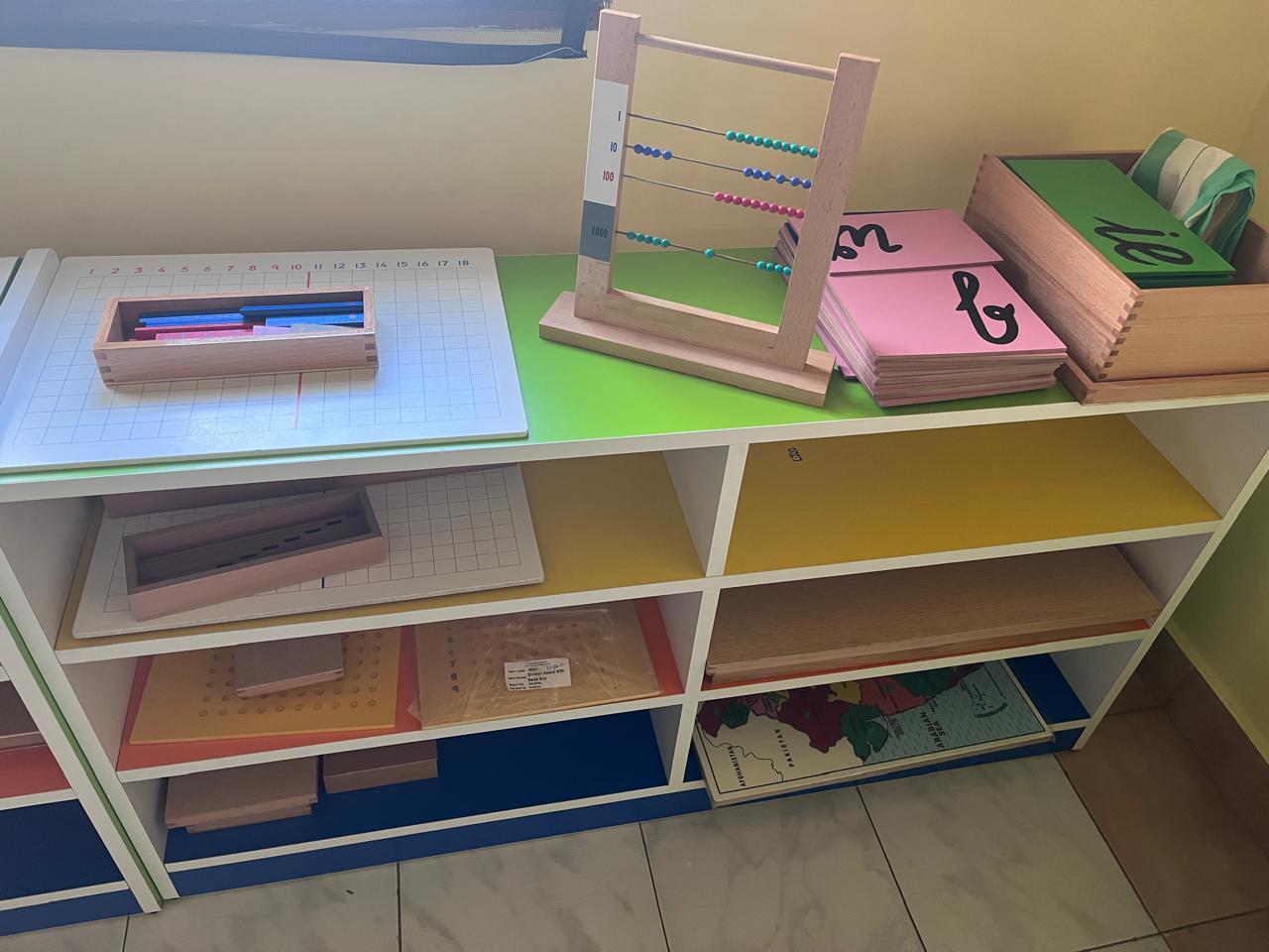 Wooden learning materials shelf